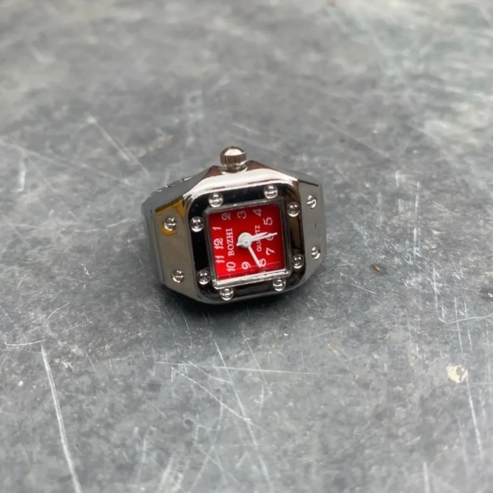 Silver and Red Wearable Tech Ring